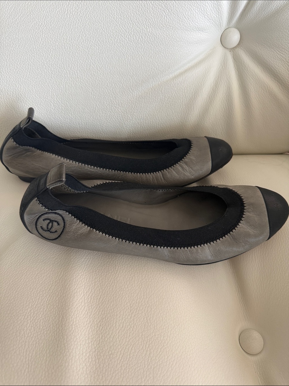 CHANEL Leather Gary and Black Cap-Toe Ballet FlatsToe Ballet Flats